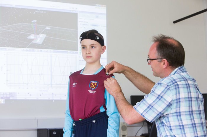 Service User David Swords with Technician at the 3D Gait Analysis Lab in CIT, Cork
