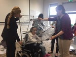 Shelly Gaynor, Expert AT User collaborates with students from Purdue University on a raincover for her wheelchair
