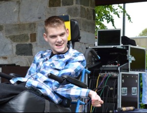 Cillian McSweeney, songwriter and music producer, Life With No Limits Champion for 2020, at a music gig